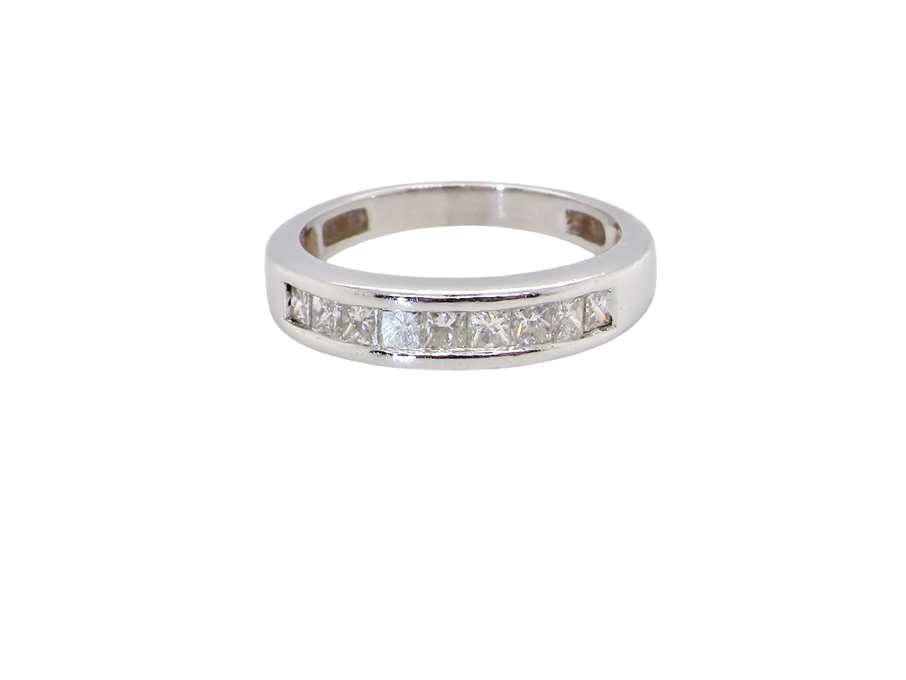 An elegant half-hoop eternity ring set with nine princess-cut white diamonds, each measuring approximately 2.5mm, with a total estimated diamond weight of 0.90 carats.