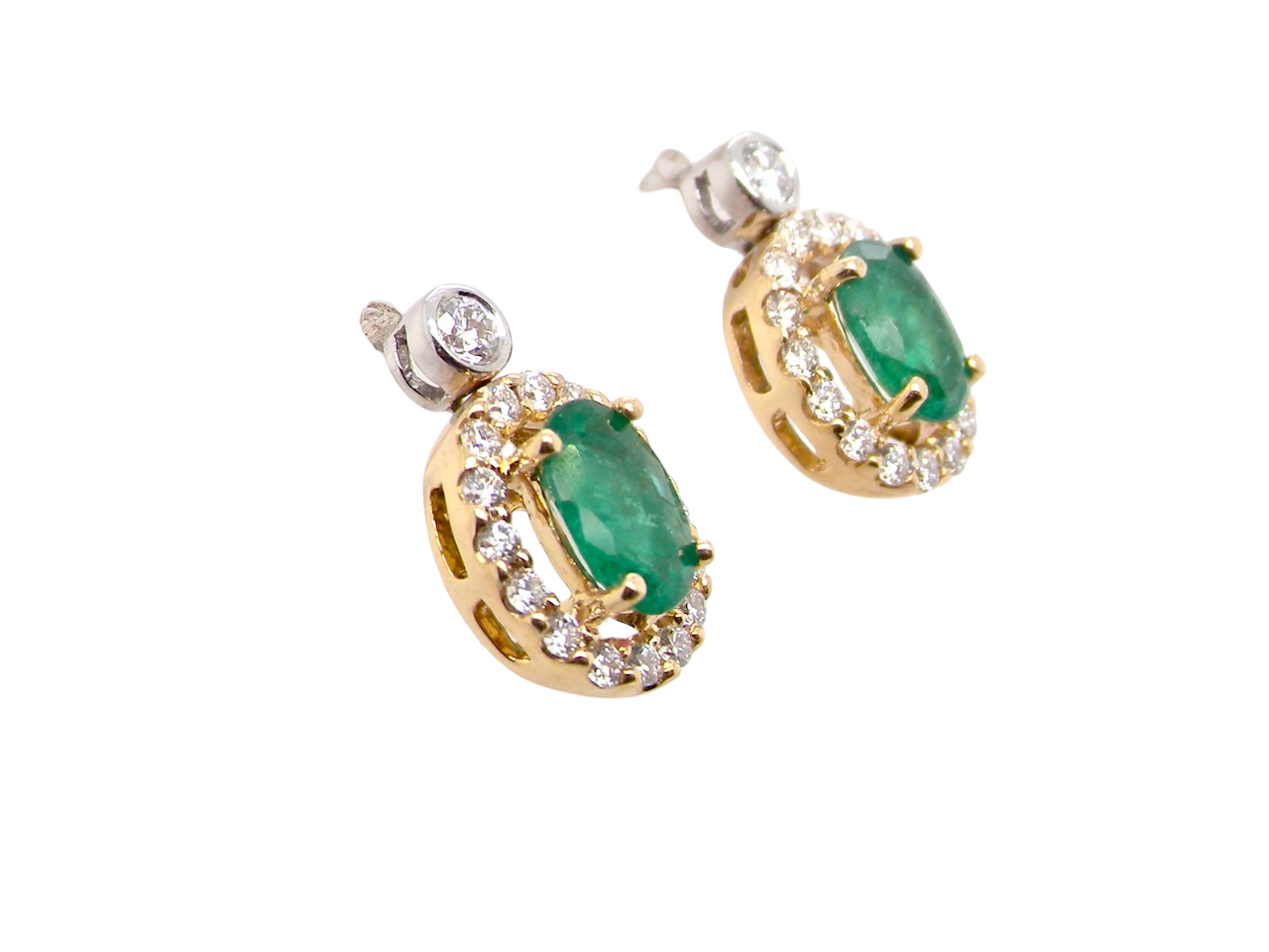 An elegant pair of emerald and diamond drop earrings, beautifully crafted in 18 carat gold.