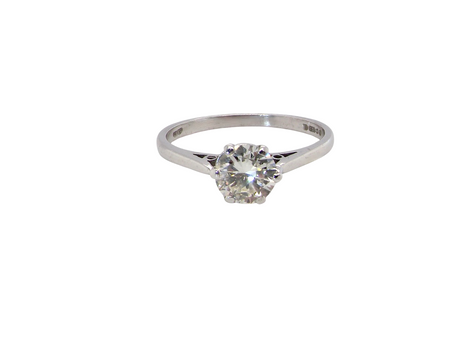 An elegant single-stone solitaire ring set with an exceptional brilliant-cut white diamond, estimated at approximately 0.91 carats. 