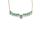 An emerald and diamond feature necklace