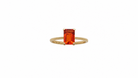 An emerald cut fire opal solitaire ring