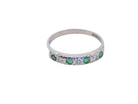 An emerald &  diamond eternity ring