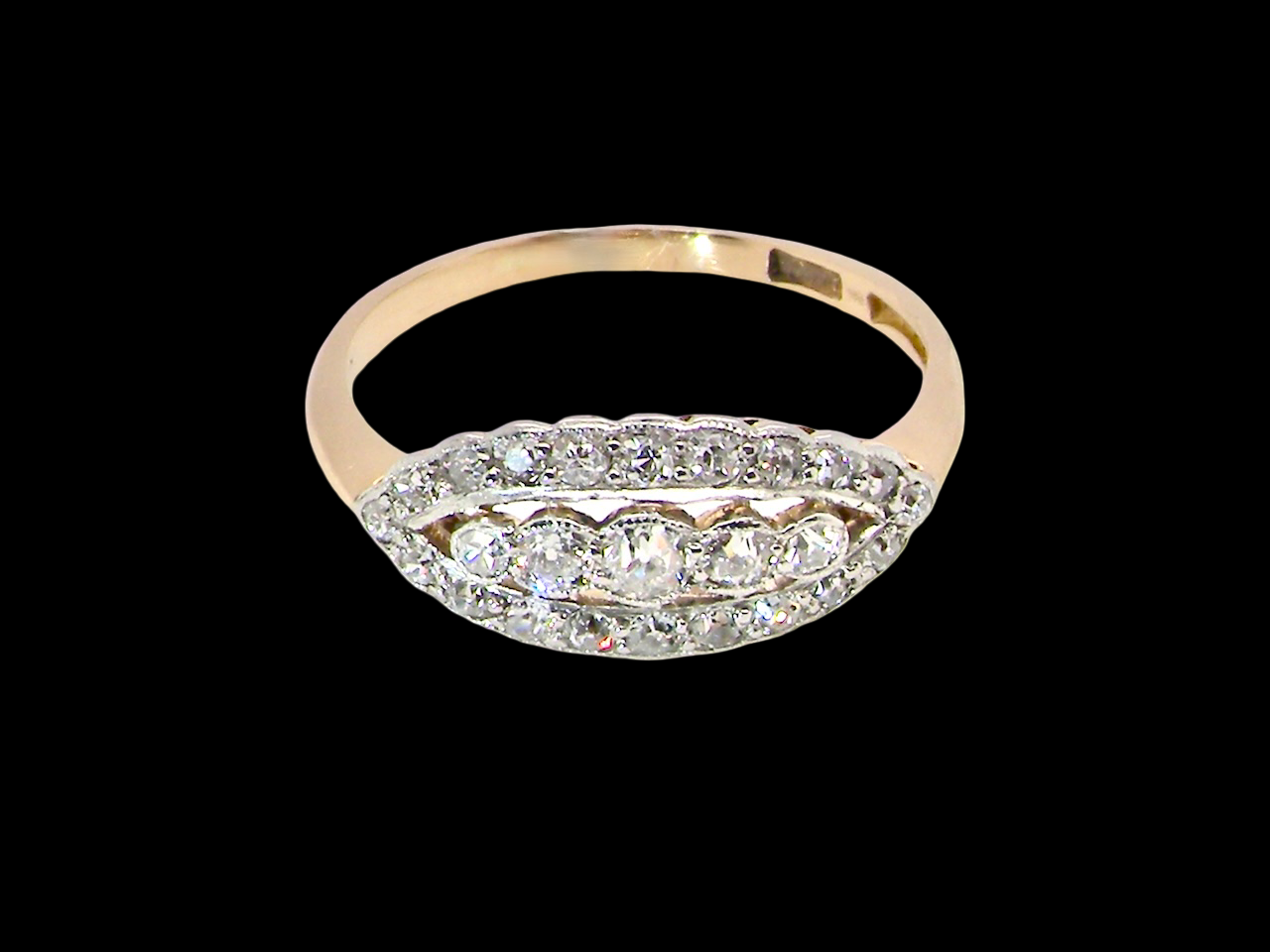 An enchanting diamond ring from the early part of the 20th century. above