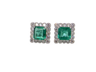 An exceptional pair of cluster earrings. Each of these beautiful earrings is set with a stunning square cut emerald, measures 7x7mm (est carat size 1.8 carats) excellent colour 