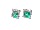 An exceptional pair of cluster earrings. Each of these beautiful earrings is set with a stunning square cut emerald, measures 7x7mm (est carat size 1.8 carats) excellent colour and clarity with just a few inclusions.