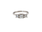 An exceptional three stone diamond trilogy ring, beautifully crafted in platinum and set with three modern brilliant cut white diamonds.