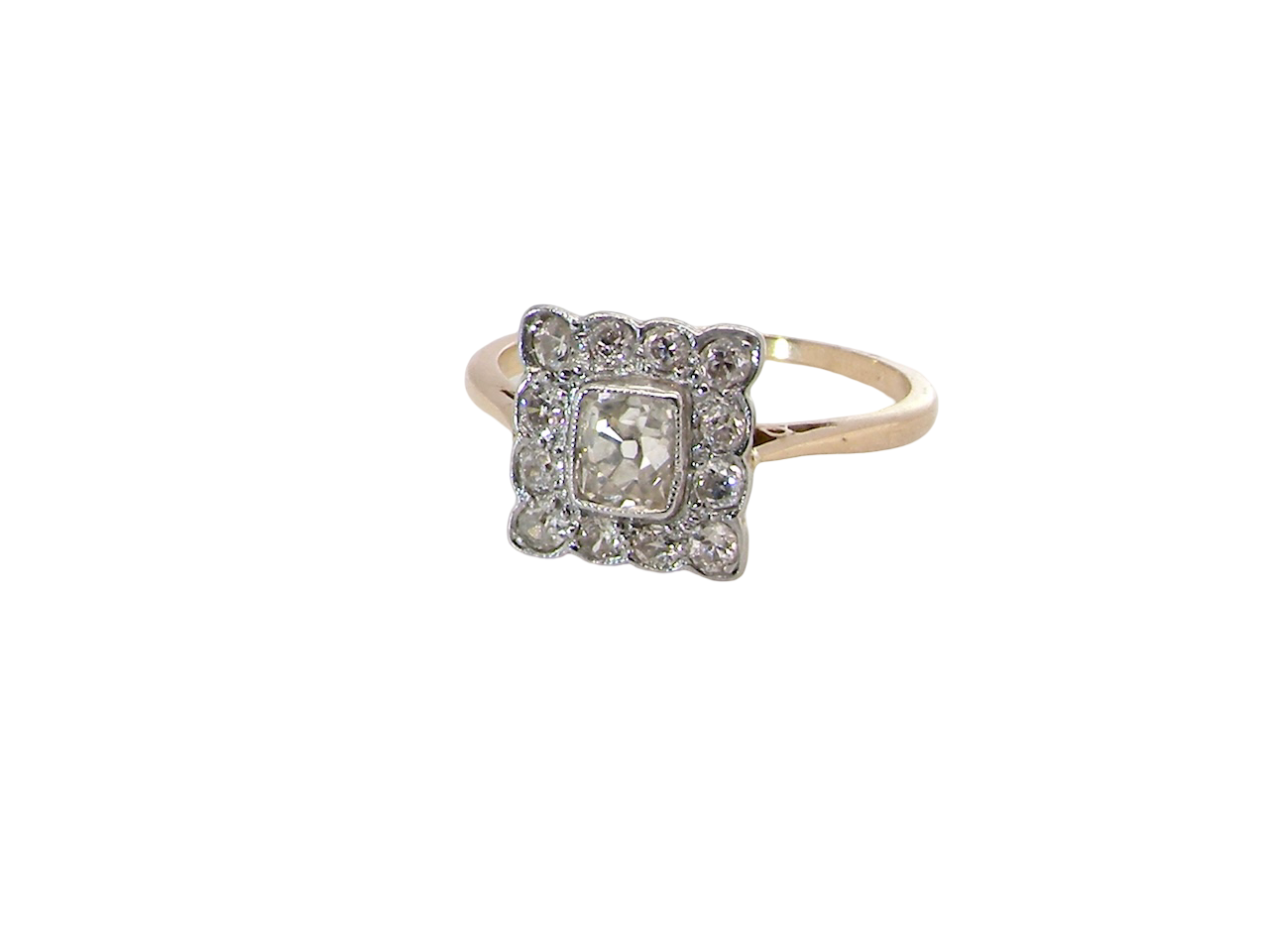  An exquisite Art Deco diamond cluster ring, beautifully handcrafted and rich in period charm.

At its centre sits a striking rectangular cut diamond measuring approximately 5 x 4.8mm, estimated at 0.50 carats, 