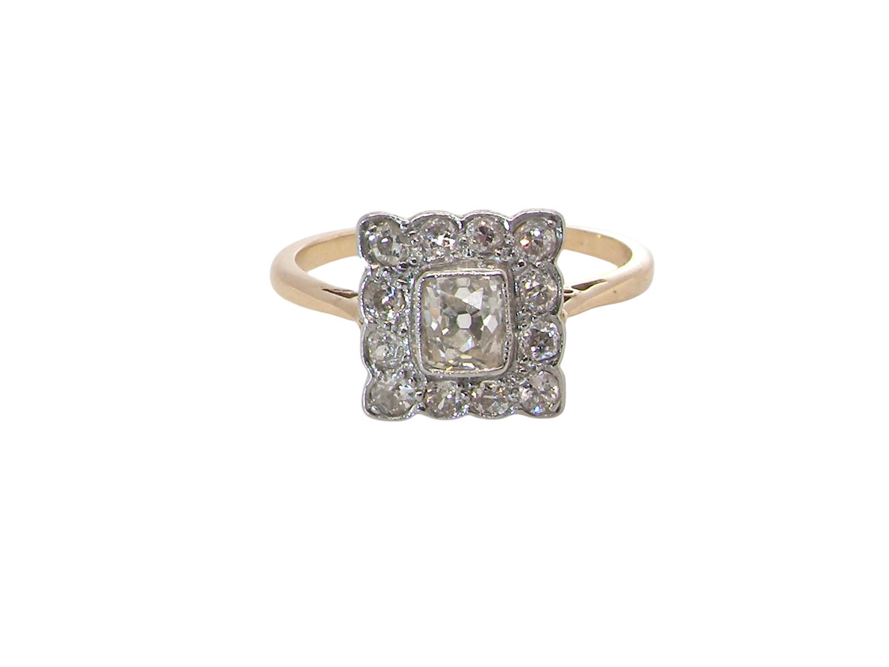  An exquisite Art Deco diamond cluster ring, beautifully handcrafted and rich in period charm.

At its centre sits a striking rectangular cut diamond measuring approximately 5 x 4.8mm, estimated at 0.50 carats, 