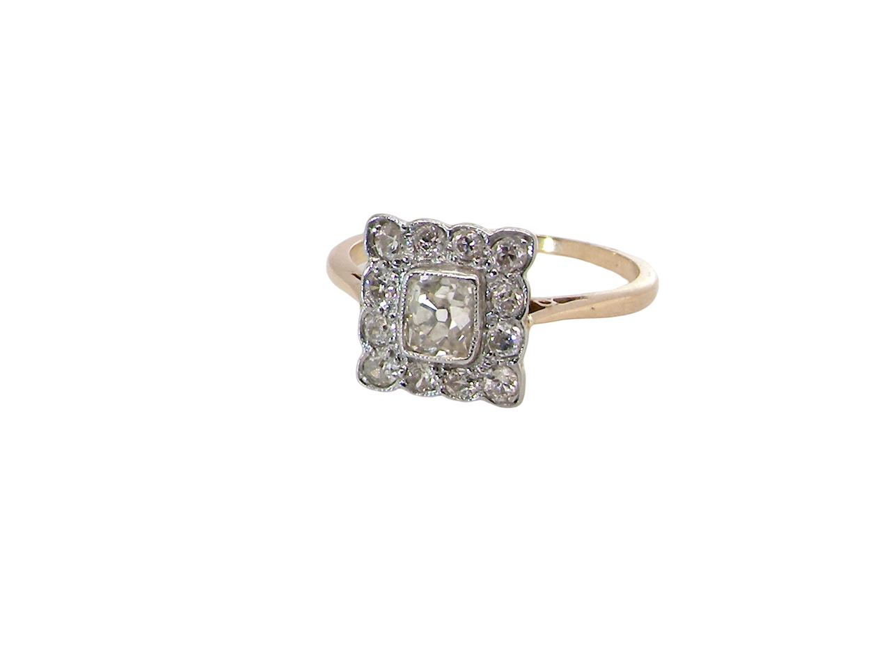  An exquisite Art Deco diamond cluster ring, beautifully handcrafted and rich in period charm.

At its centre sits a striking rectangular cut diamond measuring approximately 5 x 4.8mm, estimated at 0.50 carats, 