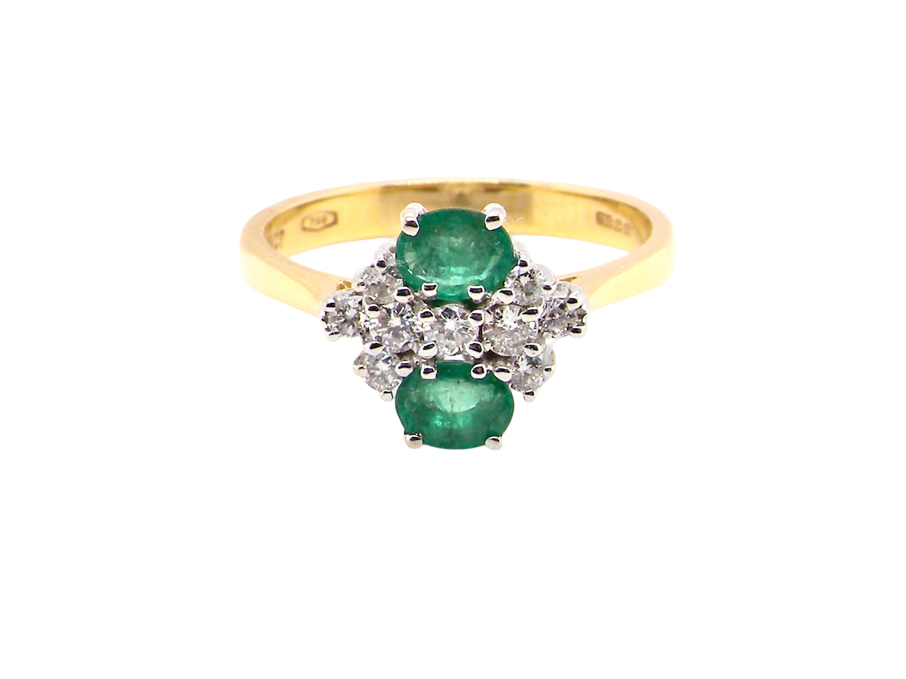 An exquisite Emerald and Diamond cluster ring