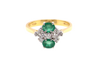 An exquisite Emerald and Diamond cluster ring