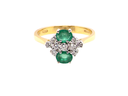 An exquisite Emerald and Diamond cluster ring