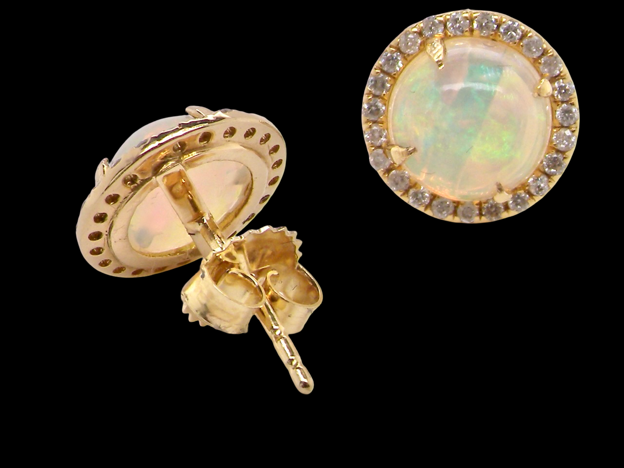 An exquisite pair of opal and diamond earrings