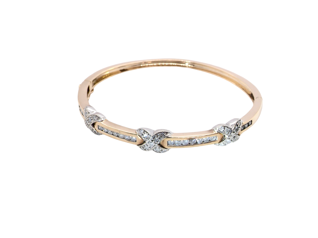 An impressive 9 carat gold bangle.&nbsp;

Three 'kiss' shaped sections , each set with nine brilliant cut white diamonds