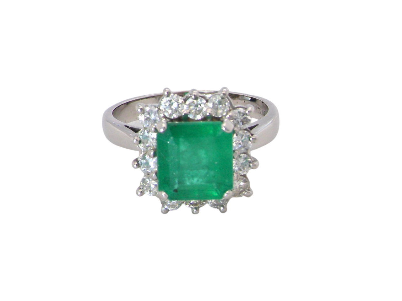 An impressive Emerald and Diamond cluster ring