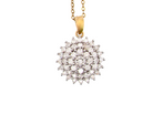 An impressive diamond pendant, set with multiple round brilliant-cut diamonds,