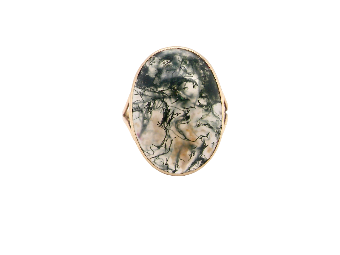 An impressive dress ring set with a large moss agate semi precious gem stone.