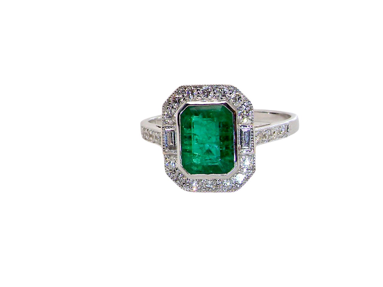 An Emerald and Diamond Cluster Ring – 18 carat White Gold