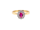 An oval cluster Ruby and Diamond Ring