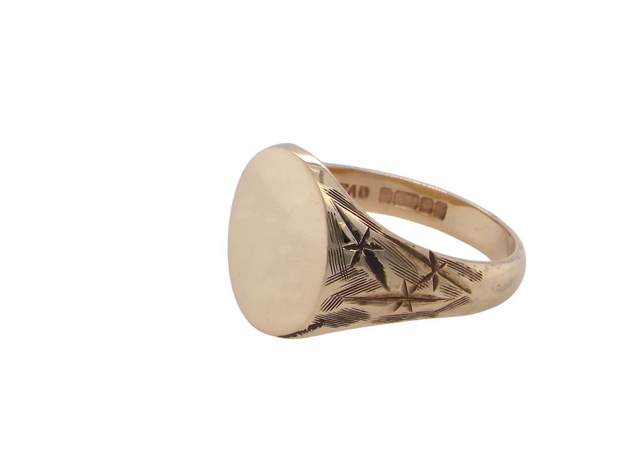 An oval shaped gentleman's signet ring. The head is plain,  for seal, crest or personalised engraving.