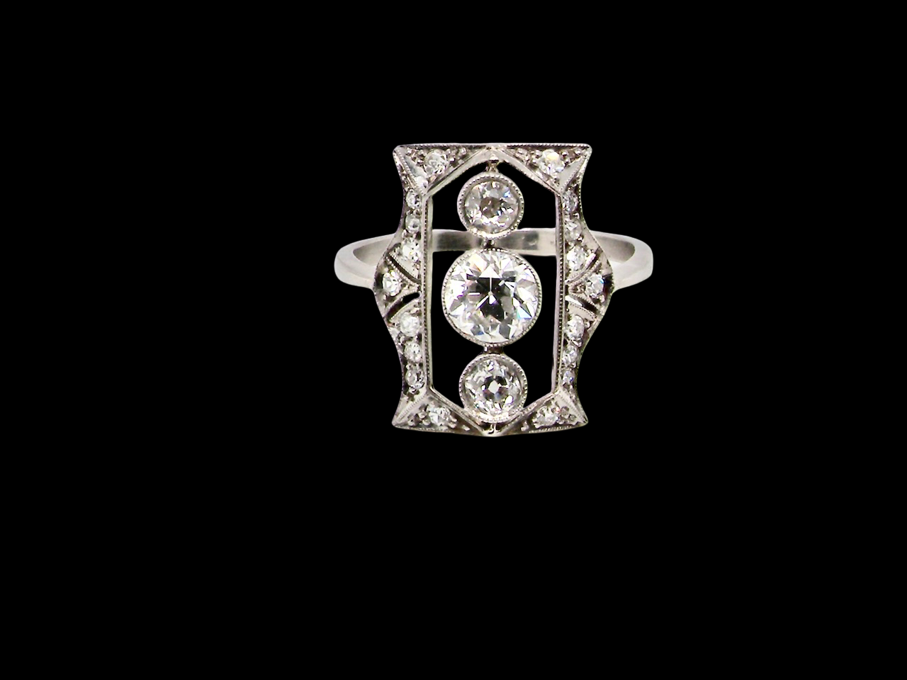 Diamond ring with a black background