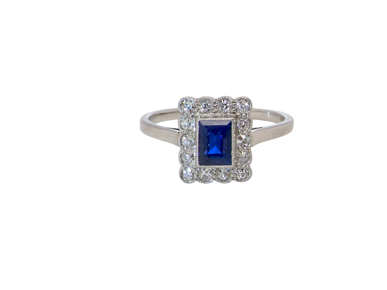  Art Deco cluster ring. Features a cobalt blue sapphire 