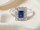  Art Deco cluster ring. Features a cobalt blue sapphire B