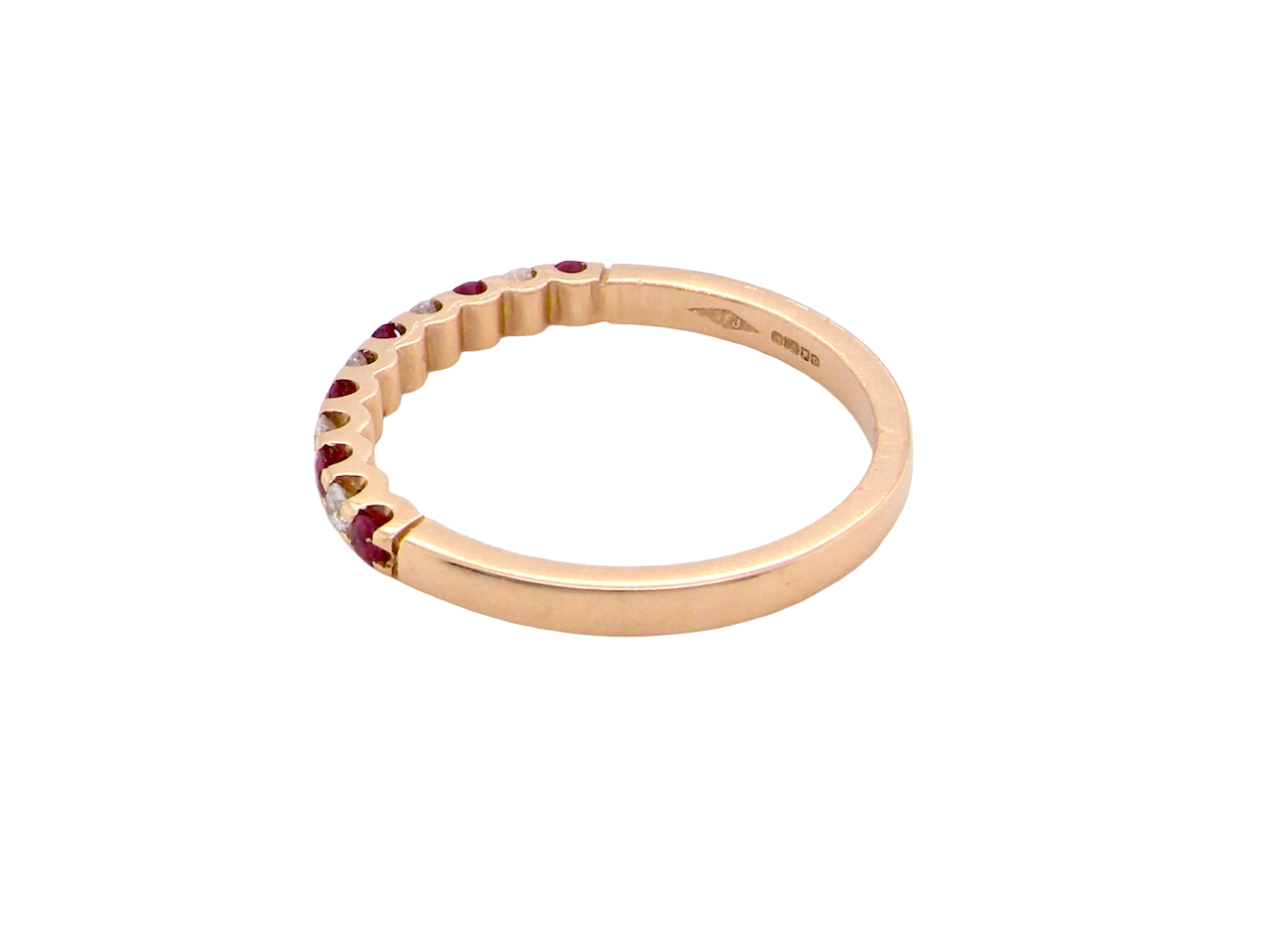 An 18 carat Ruby and Diamond eternity ring