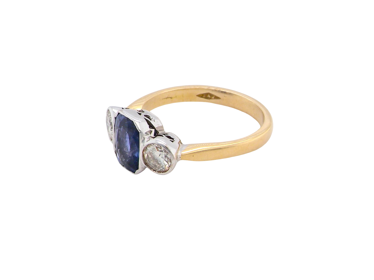 A three stone Sapphire and Diamond ring