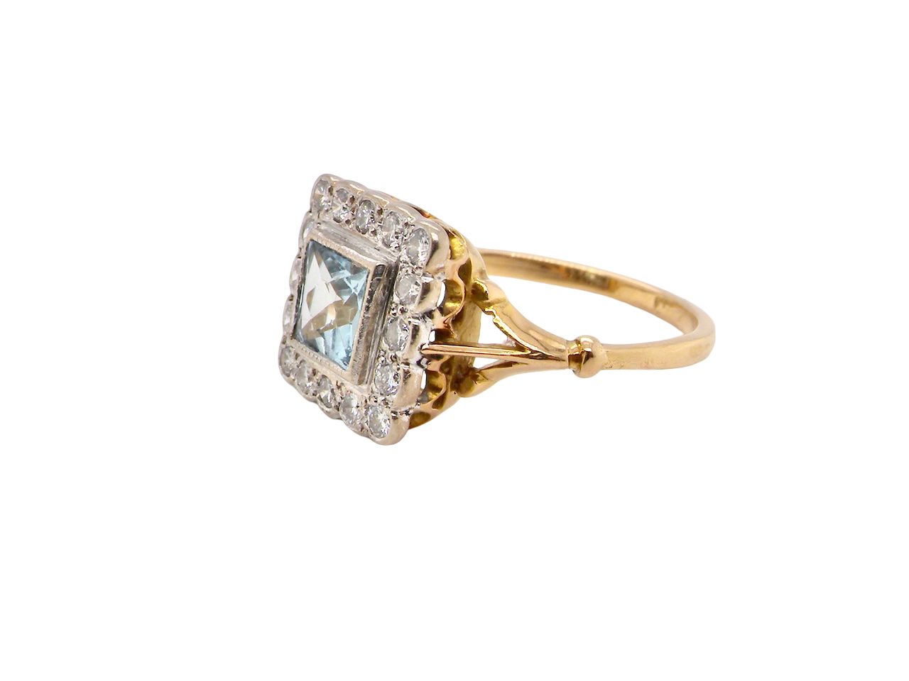 A vintage Aquamarine and Diamond cluster ring