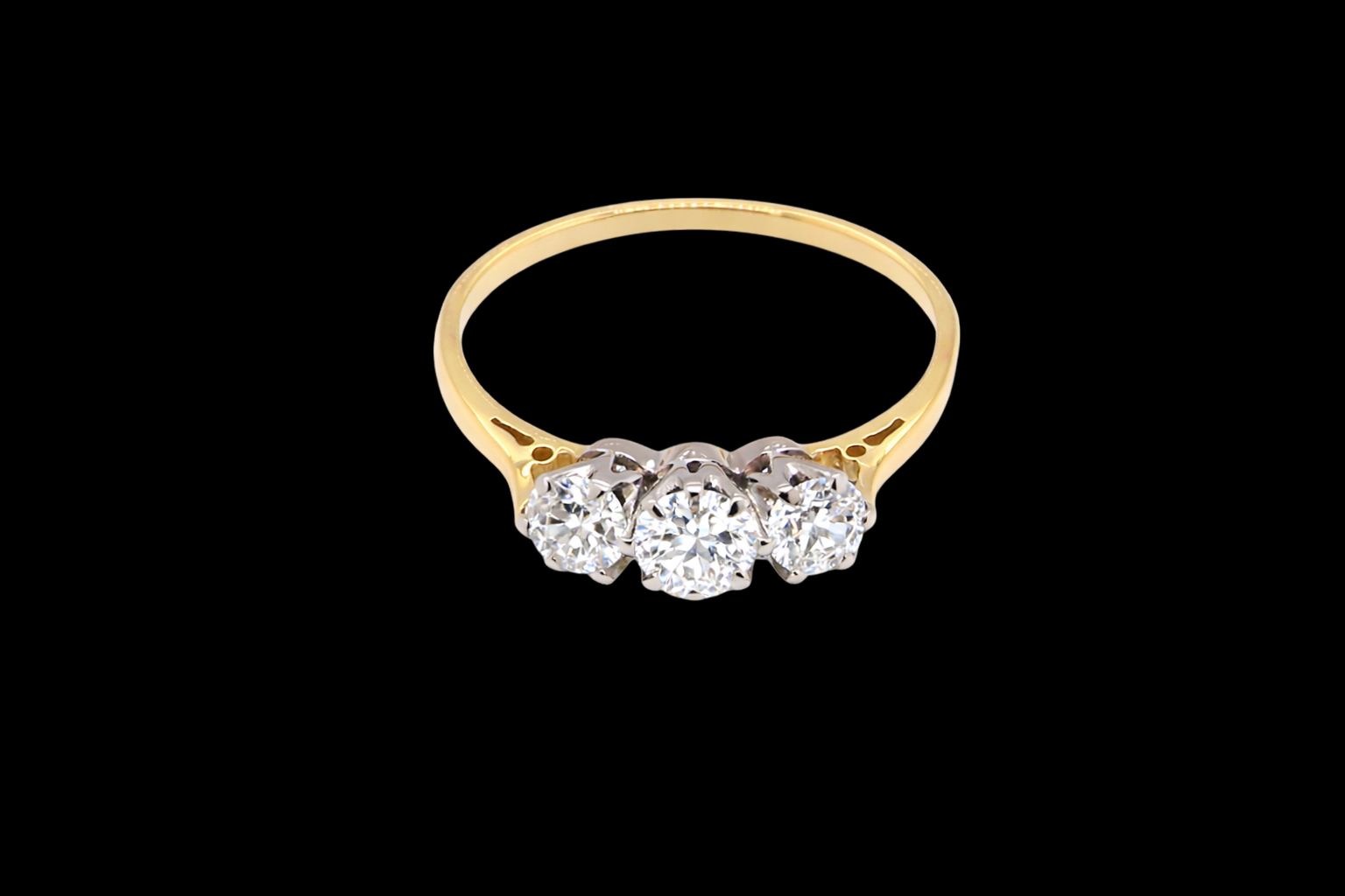 Diamond ring  Band tests as 18 carat yellow gold. No hallmarks present as not required for the period, assumed here to be 1930-1940. 