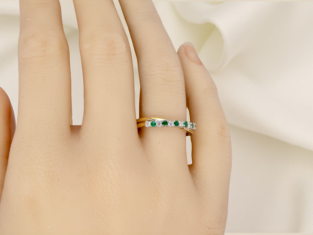 An Emerald and Diamond eternity ring
