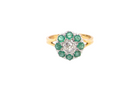 A vintage 1960s cluster ring. Principal stone a brilliant cut white diamond, 0.45 carats (5mm diameter)&nbsp;