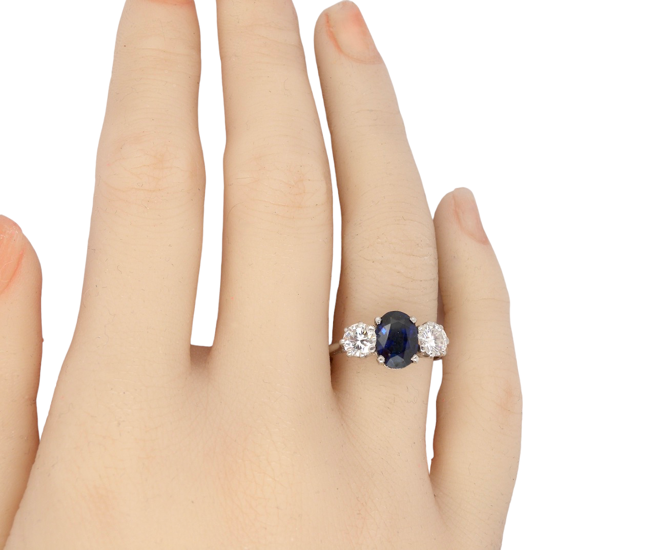 A sapphire and diamond trilogy ring