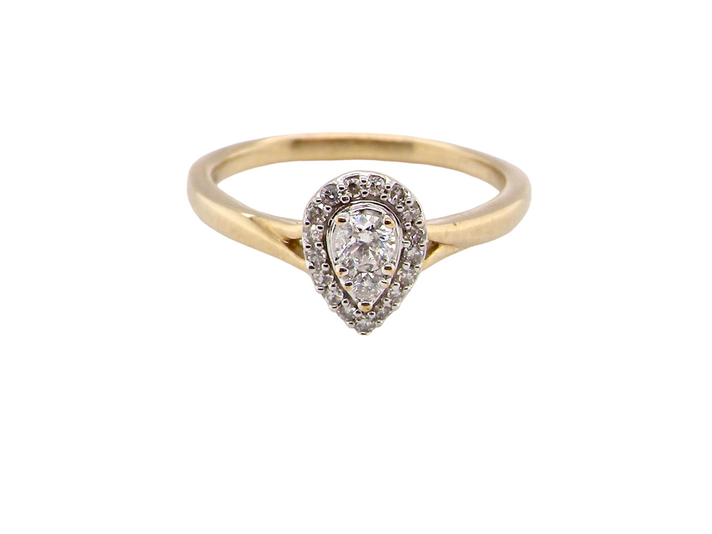 A pear shaped diamond cluster ring
