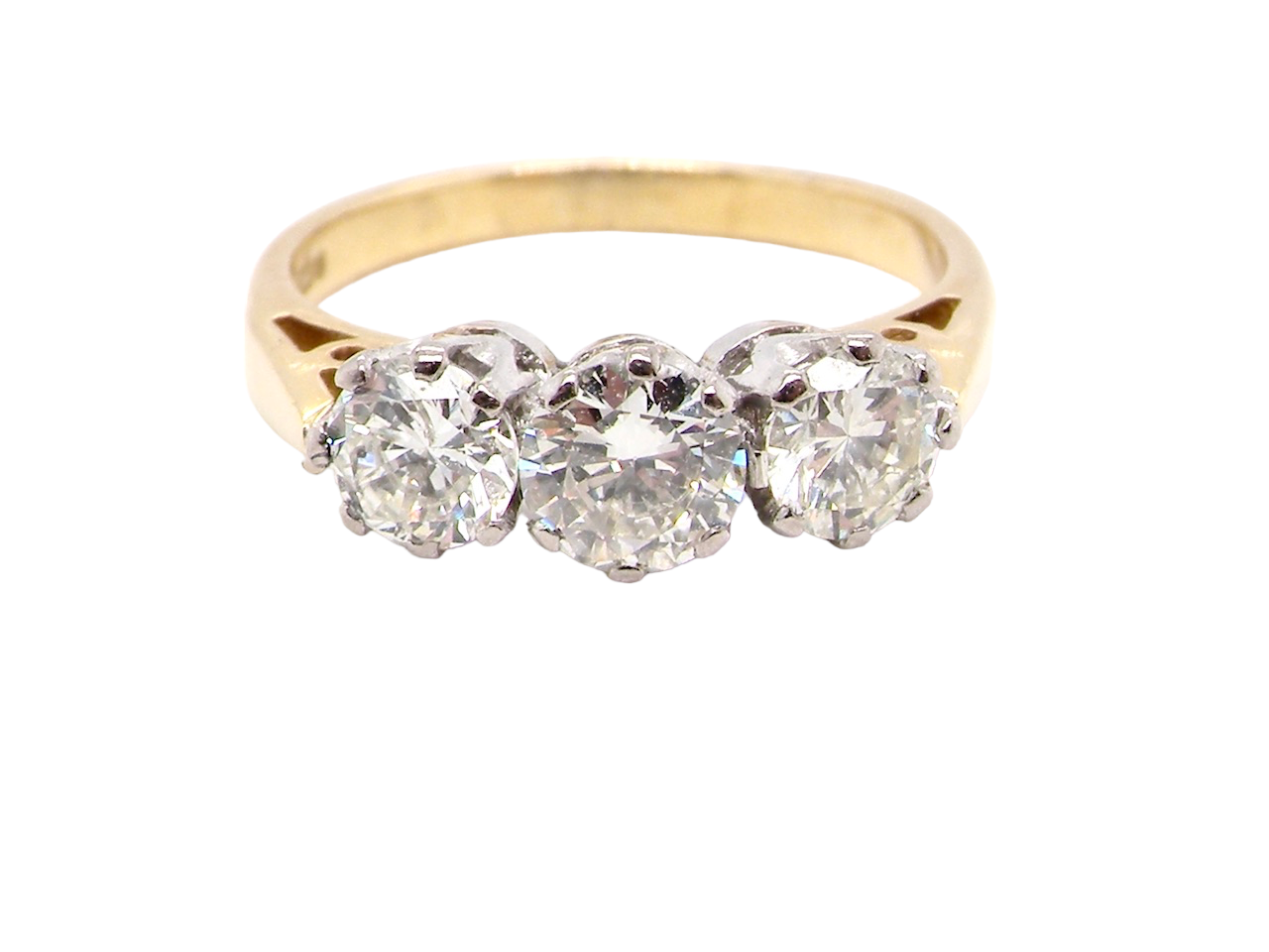 A three stone diamond trilogy ring