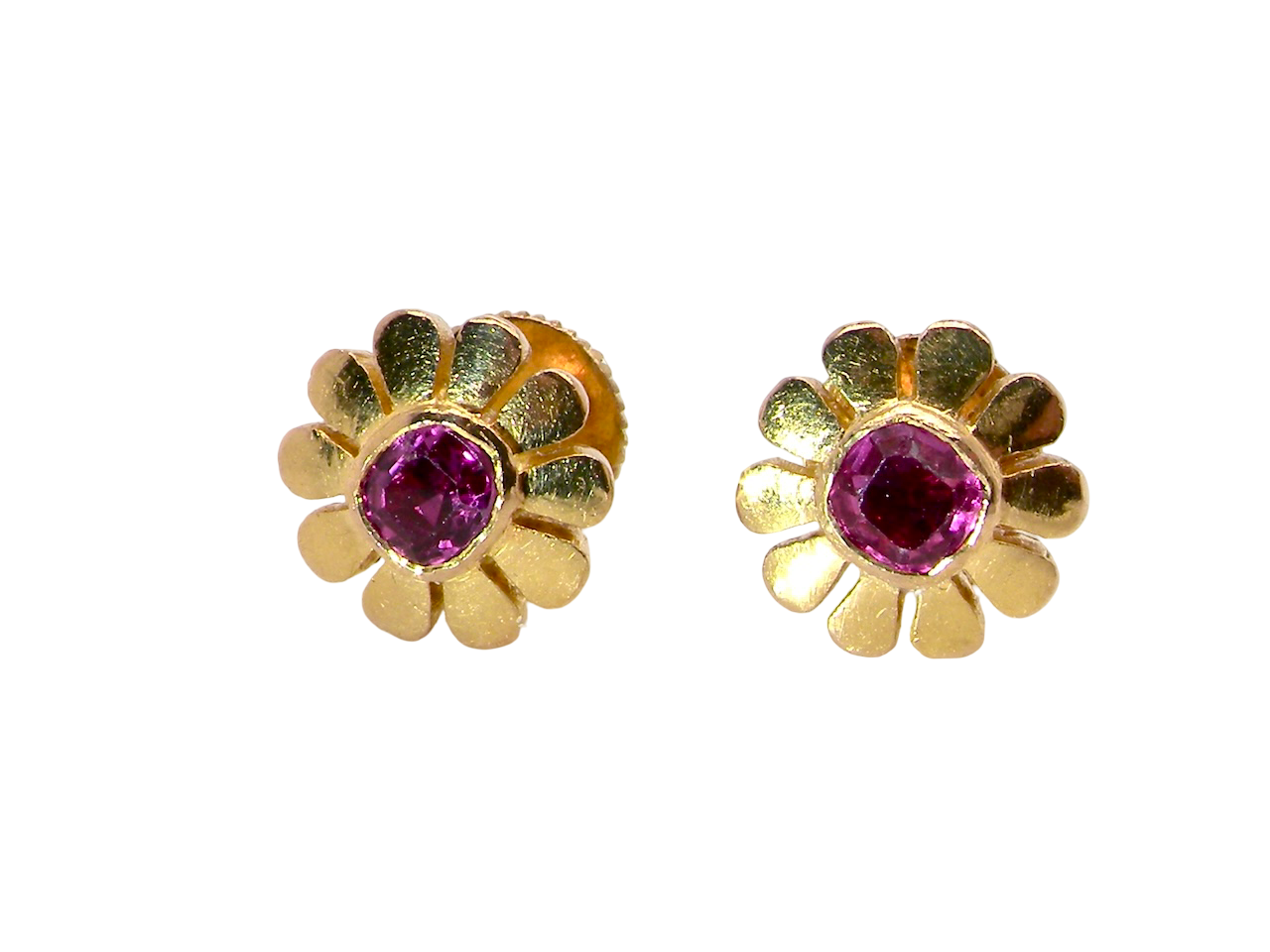 An exceptional pair of ruby earrings.Each earring is centred with a cushion-shaped ruby measuring approximately 3.6–3.8mm, 