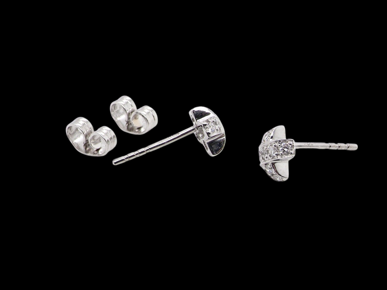 Kiss style white gold diamond earrings