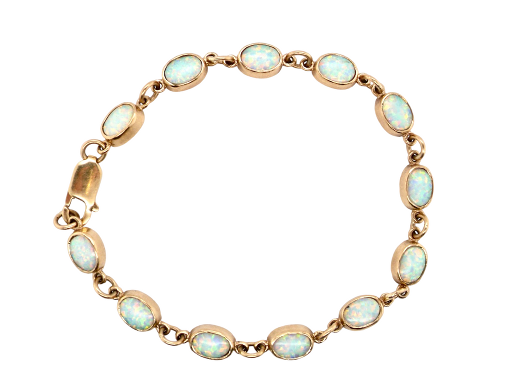  9 carat gold opal line bracelet