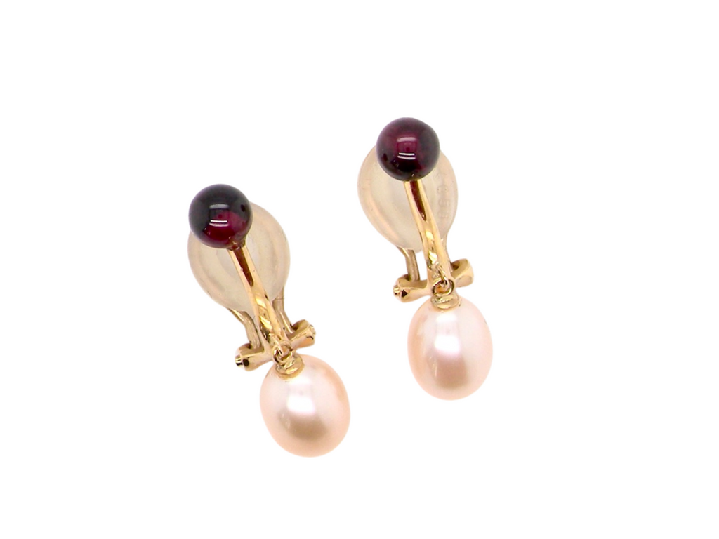 A pair of pearl and garnet earrings