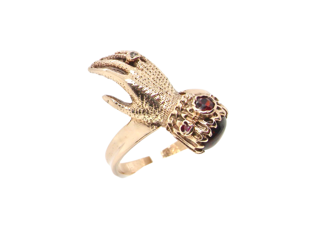 unusual  9 carat gold hand ring
