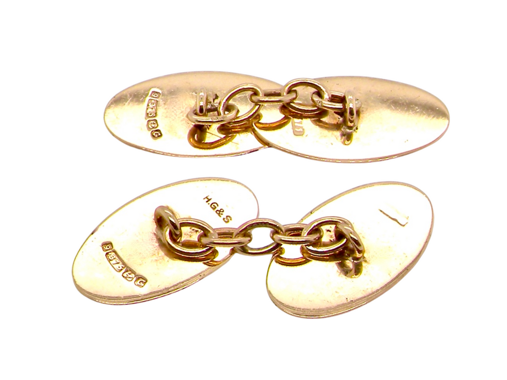 vintage pair of gold cufflinks