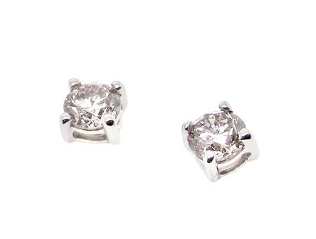 A pair of half carat diamond stud earrings