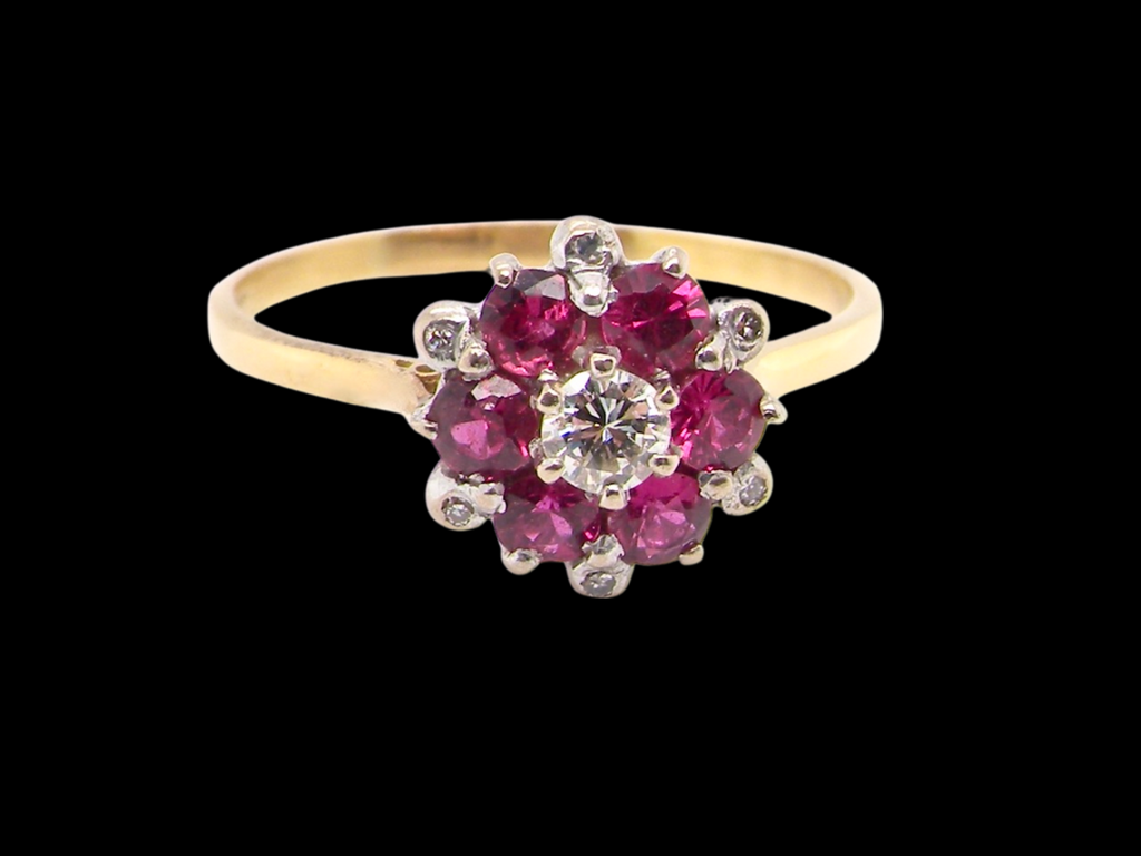 A ruby and diamond engagement ring