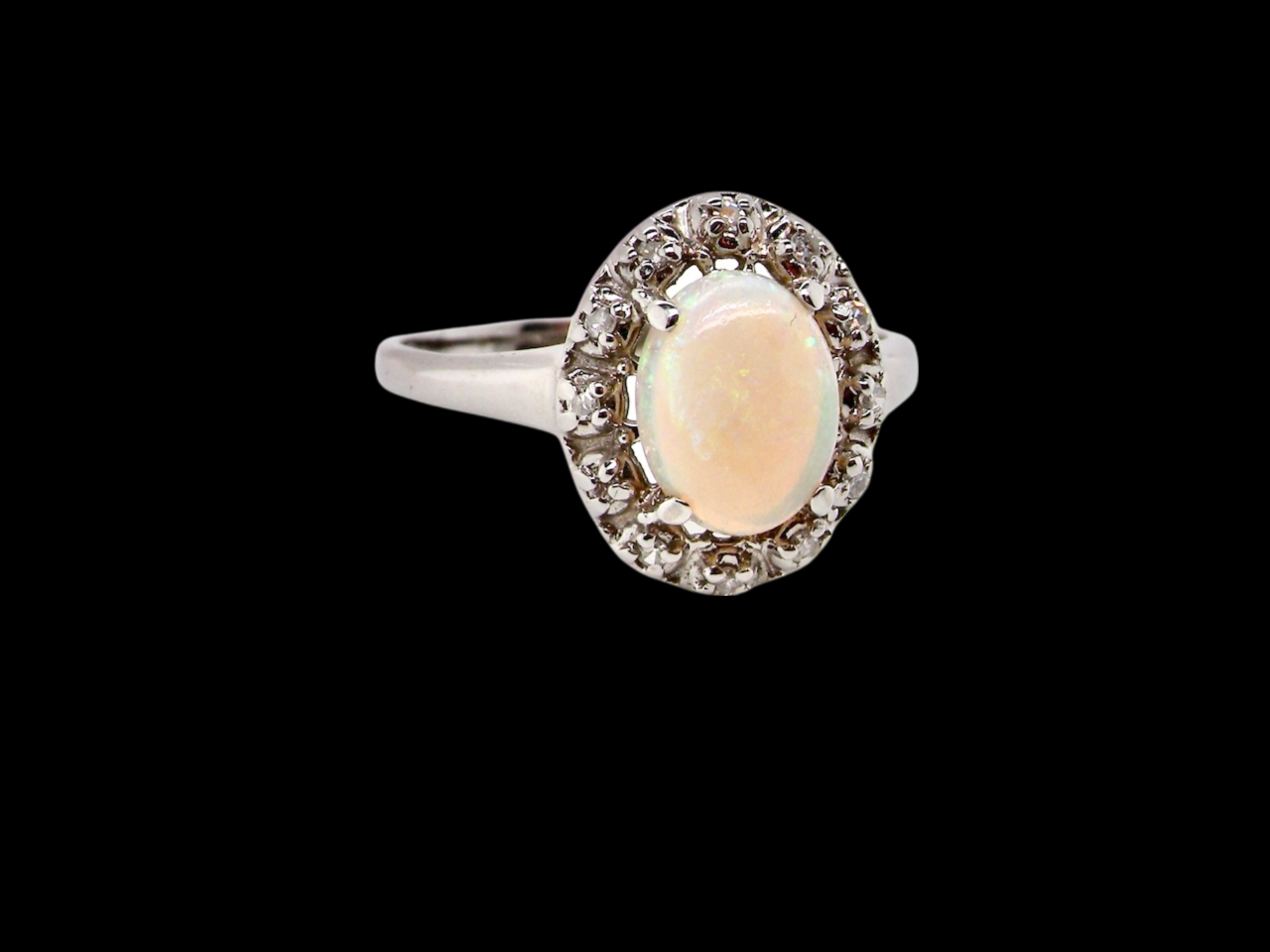 white gold opal and diamond cluster ring