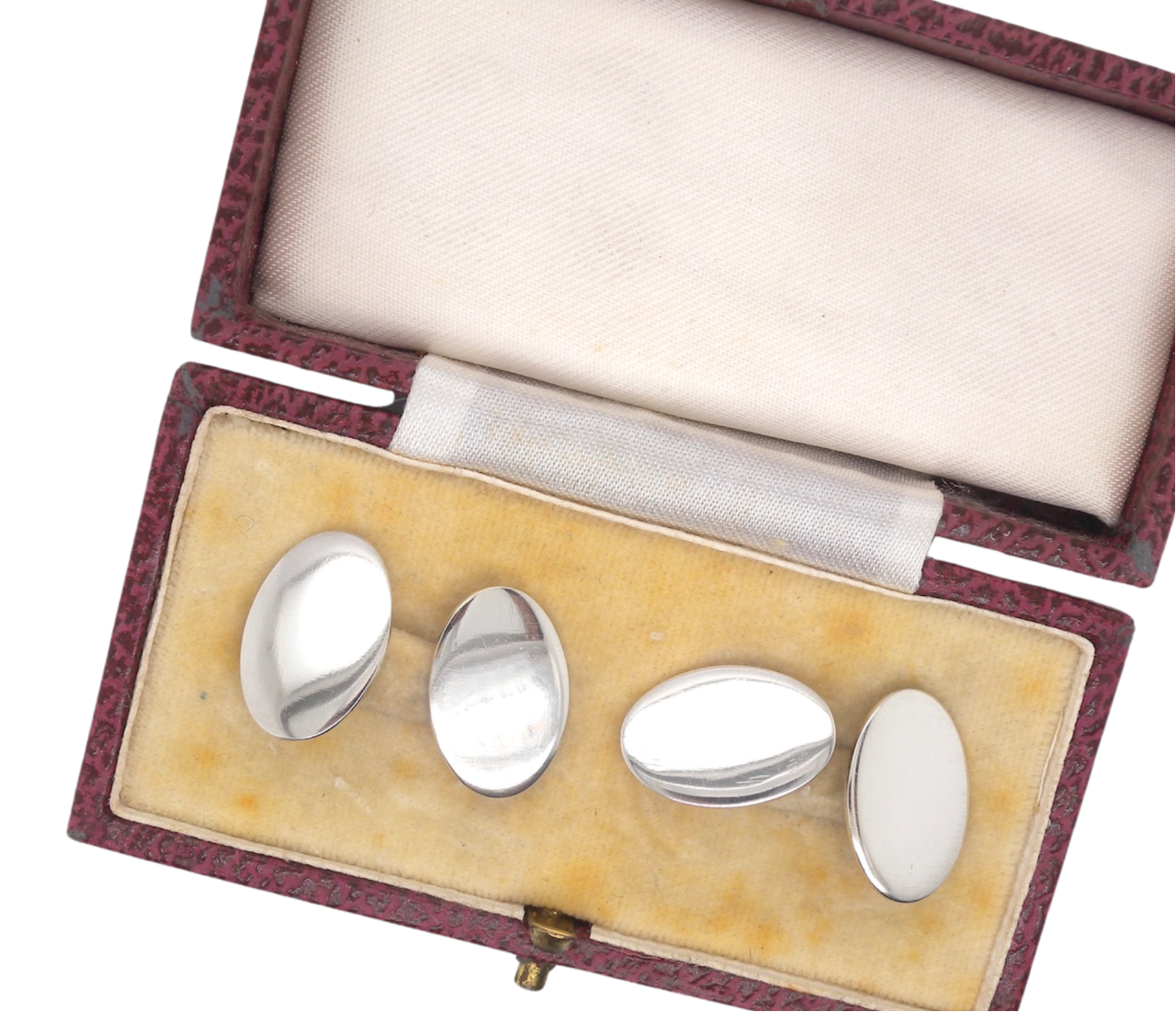 A pair of silver cufflinks