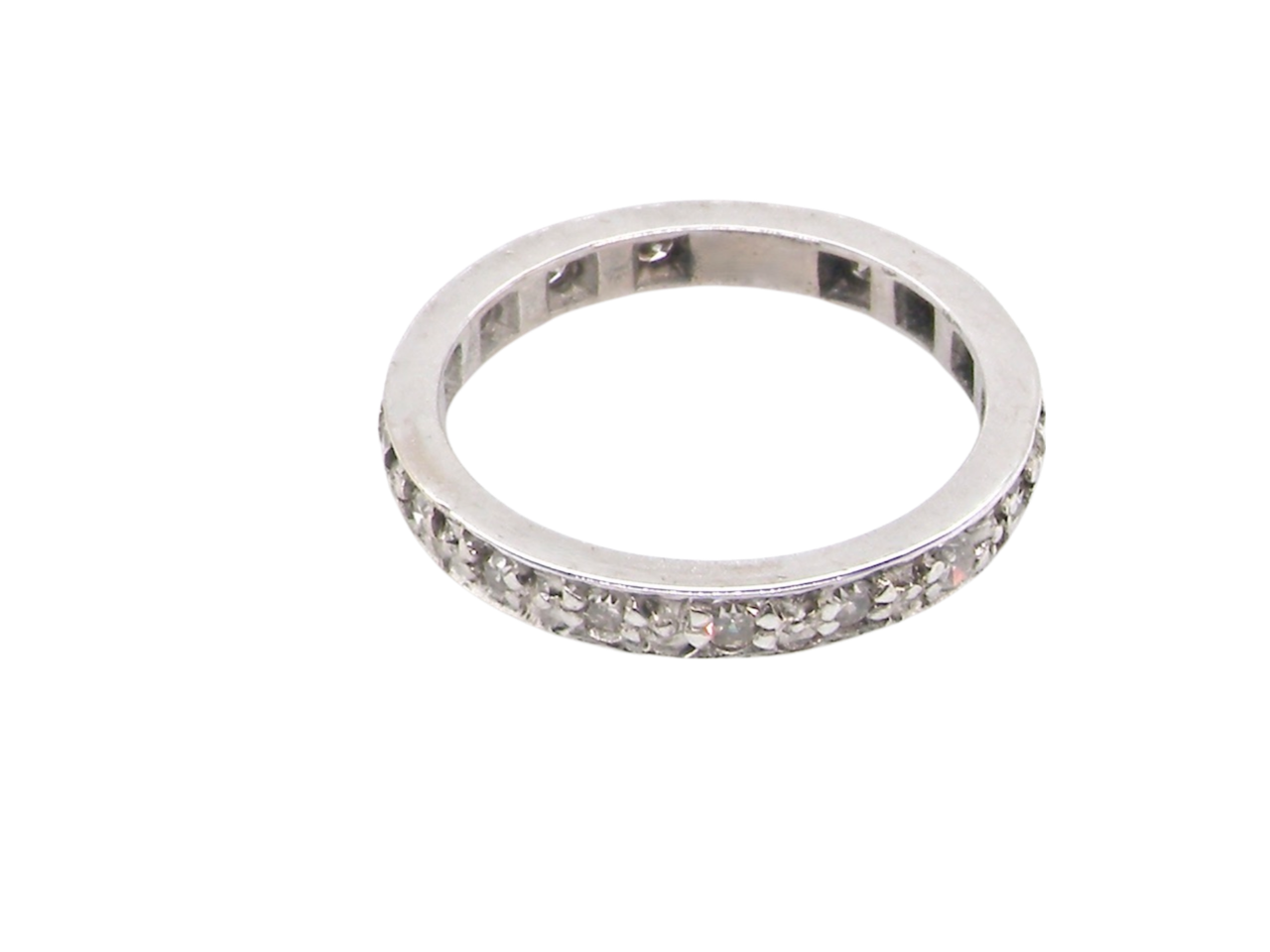 An 18 carat white gold diamond eternity ring