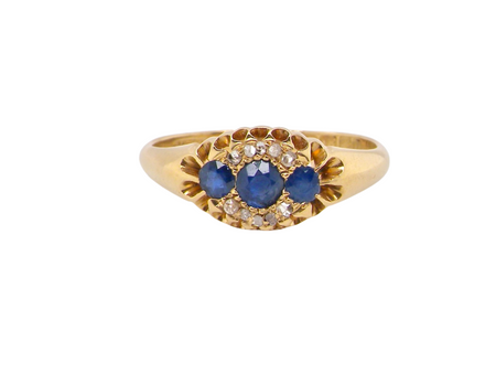 An 18 carat gold Edwardian sapphire and diamond ring