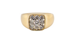 An 18 carat gold diamond cluster signet style ring