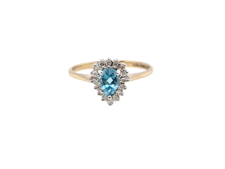 A pear shaped Topaz and Diamond ring